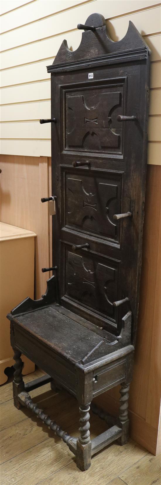 An ebonised oak hall stand, H. 190cm